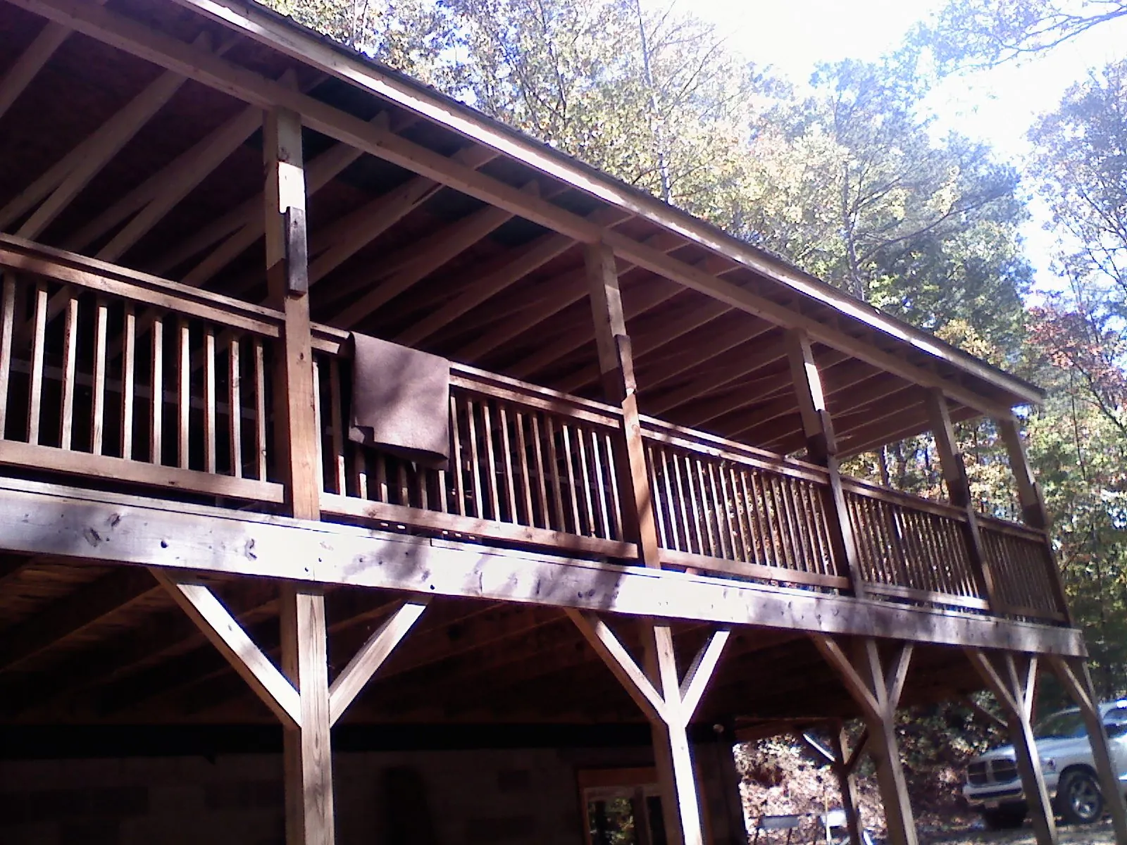 Timber framing under a new elevated porch and deck — Roof Leak Repair in Neenah by Roofing Brothers